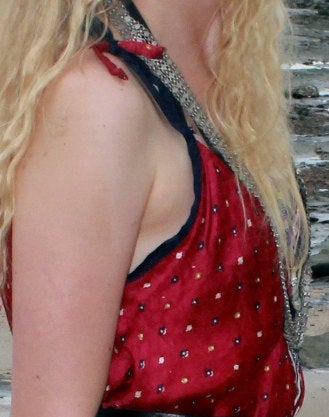 Jumpsuit silk one size with adjustable straps.