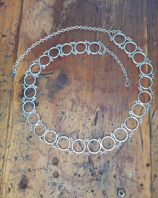 A turkish silver belt made of round rings