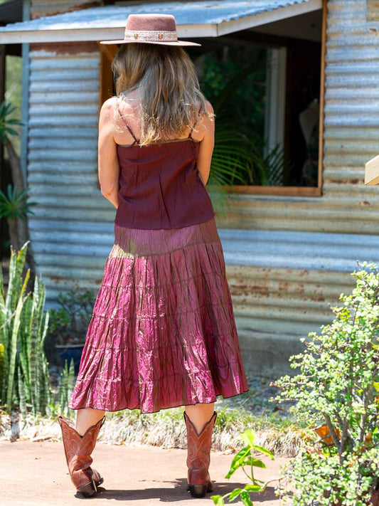 A silk tiered skirt in rust - olive tones