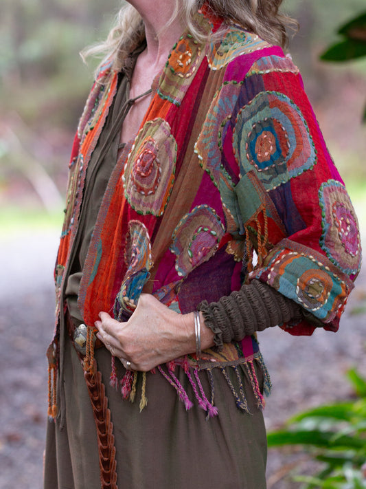 Wool fringed jacket with round spiral design 