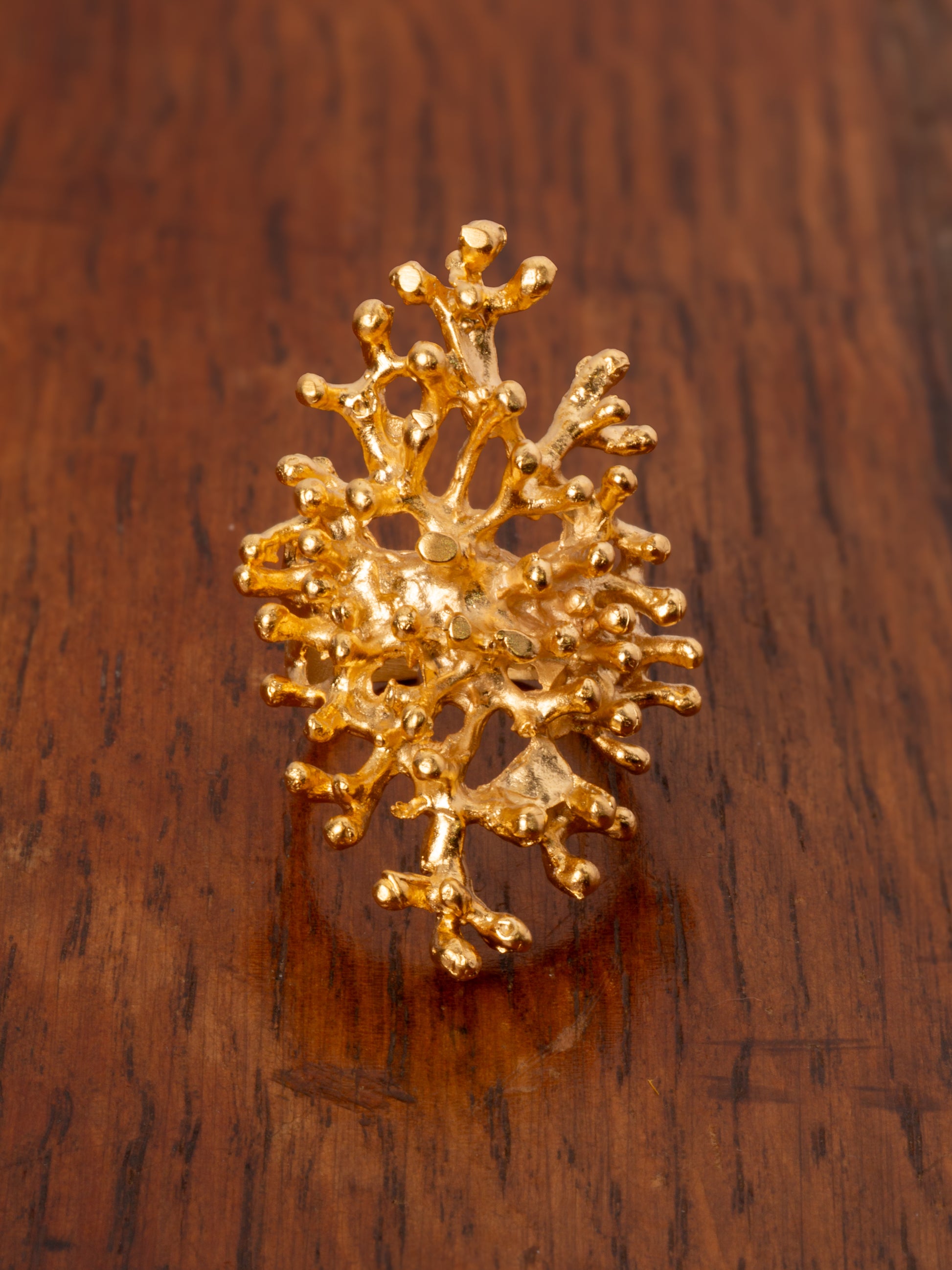Gold molten larva or coral style ring