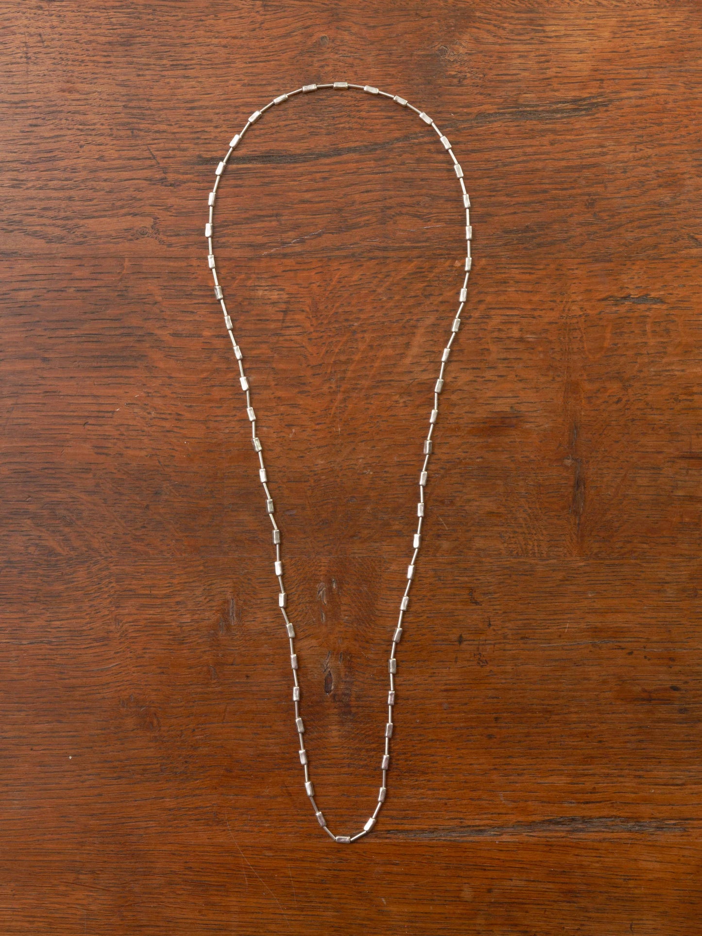 rectangular silver beads threaded necklace