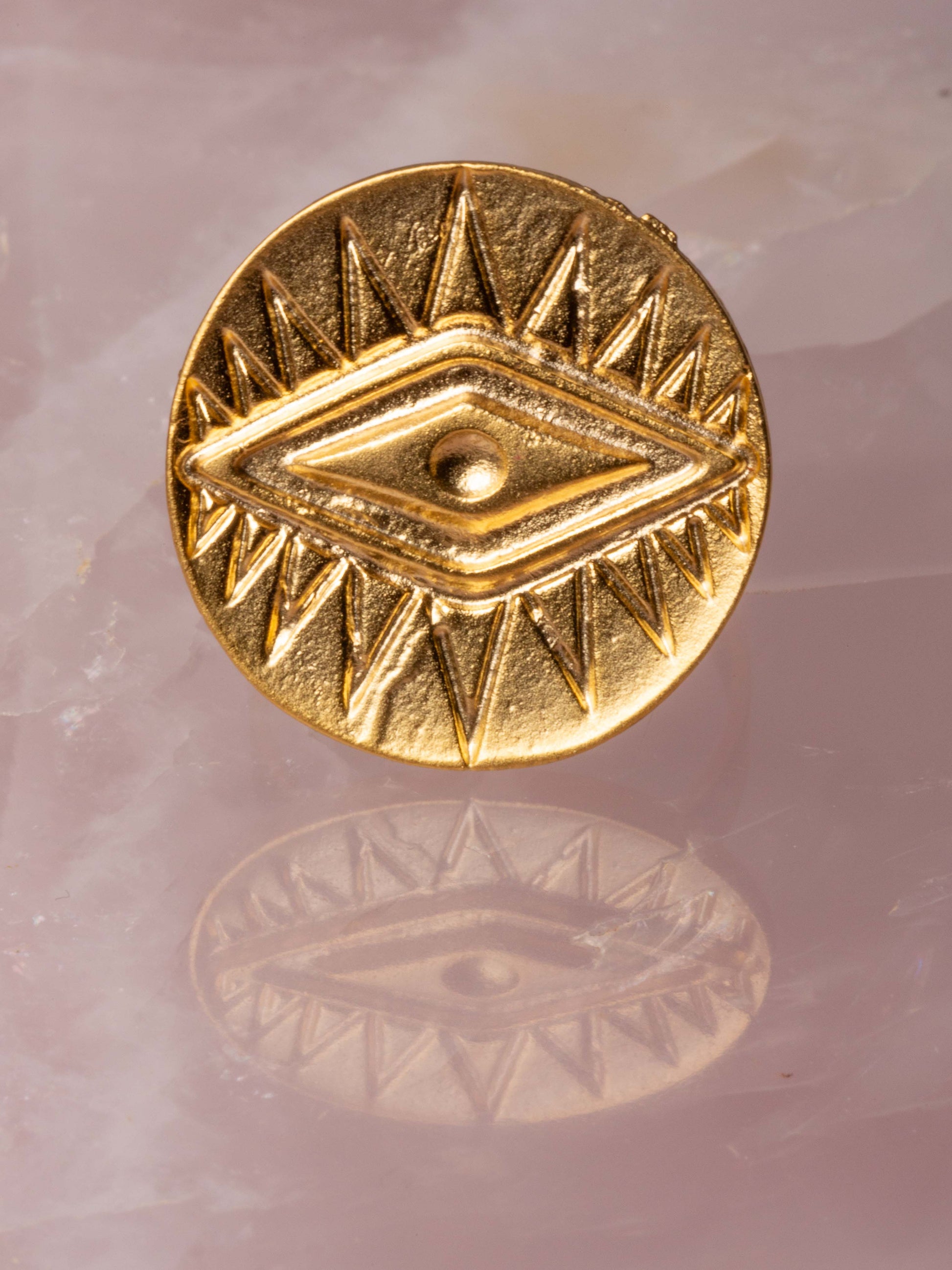 gold ring with angular eye design