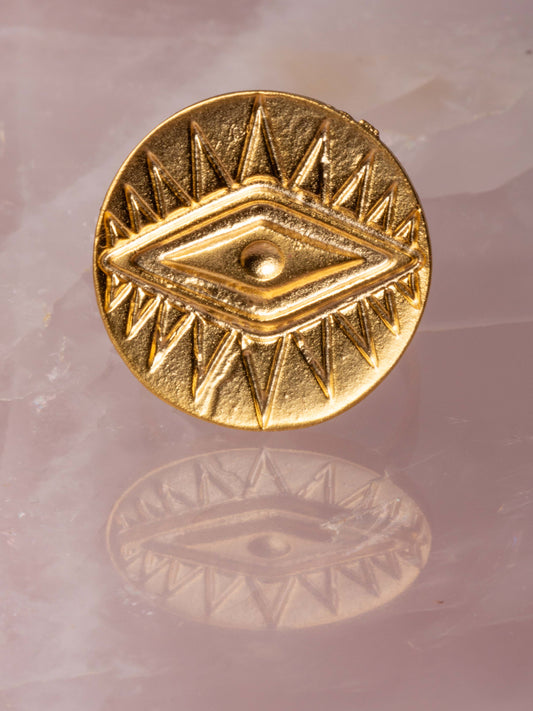 gold ring with angular eye design