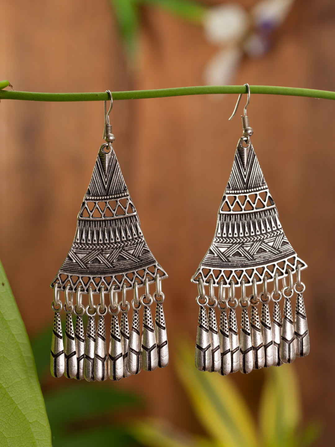 Triangle shaped earrings with dangles
