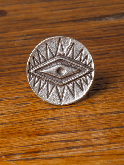 silver ring with diamond eye design