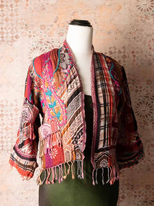 Rainbow coloured jacket with colourful wool top-stitching