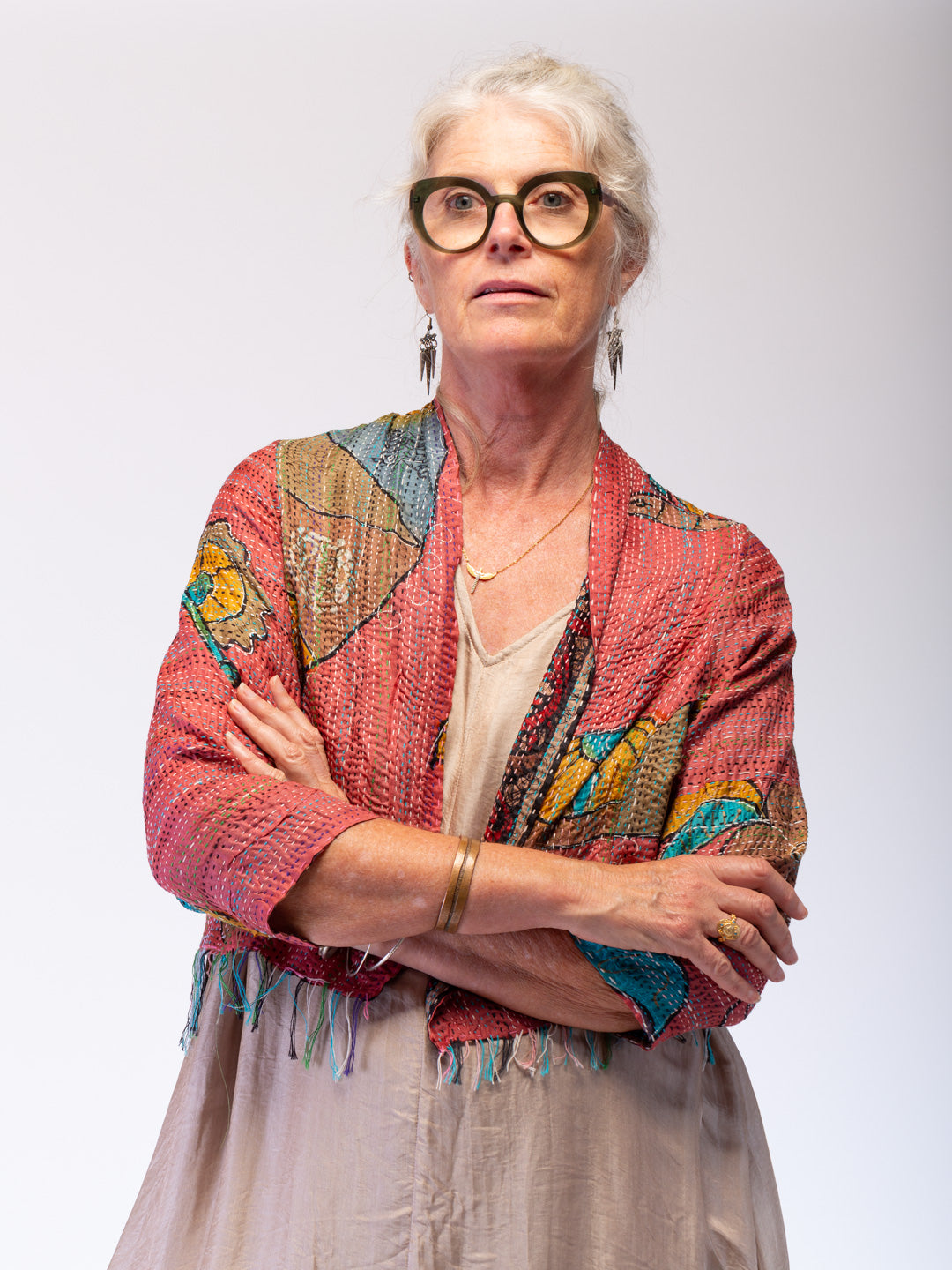 woman wearing silk kantha jacket
