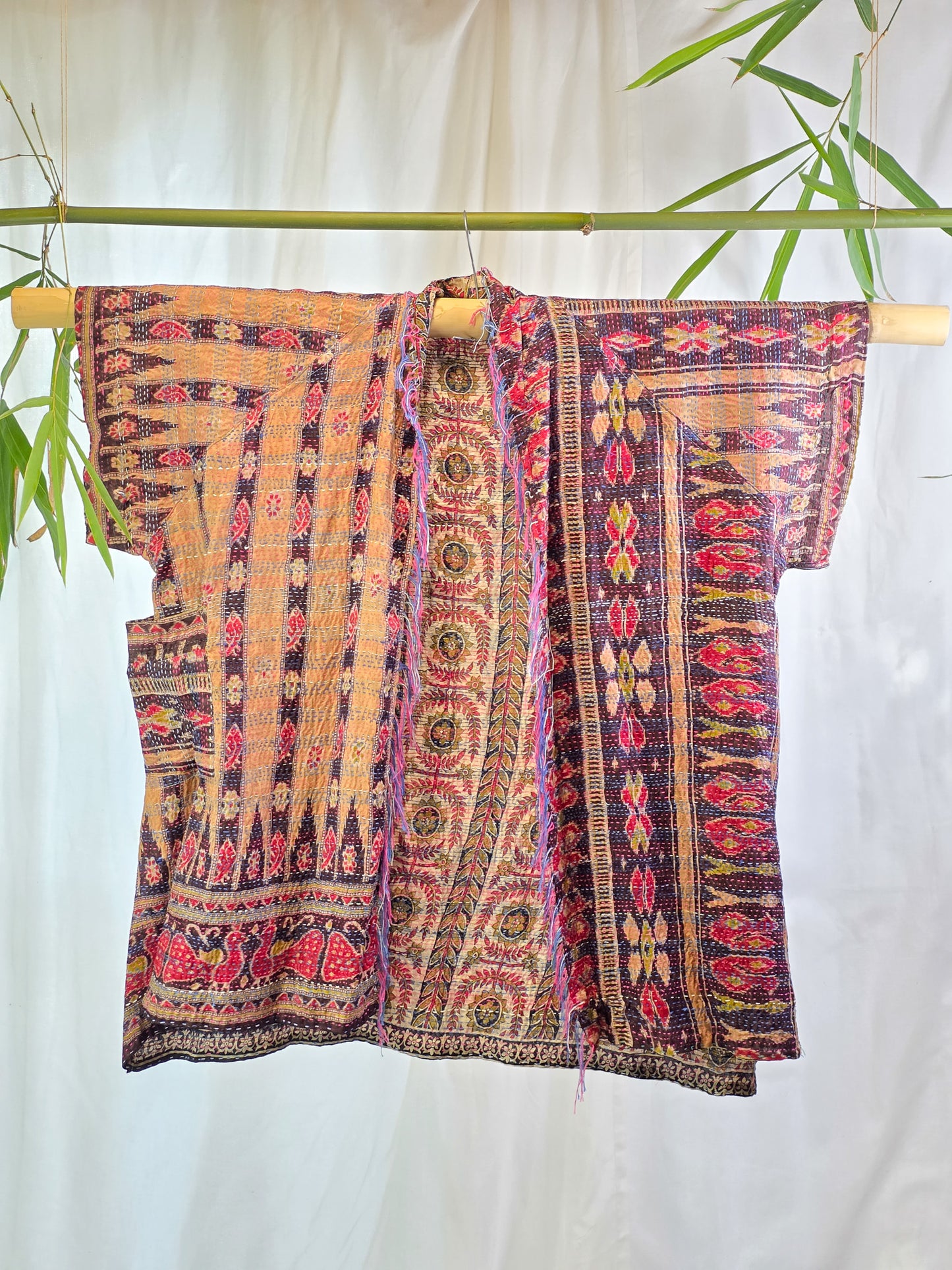 A red and tan coloured silk kimono on a white background, silver cocoonz