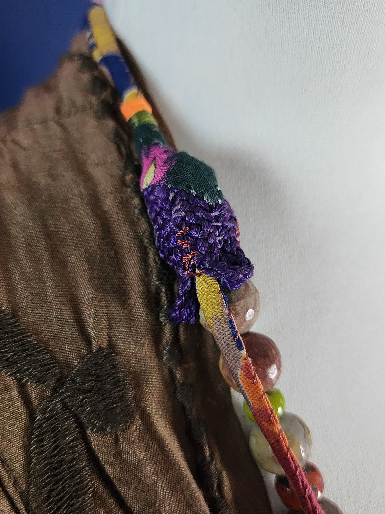 Mixed semi-precious beads with fabric ornaments