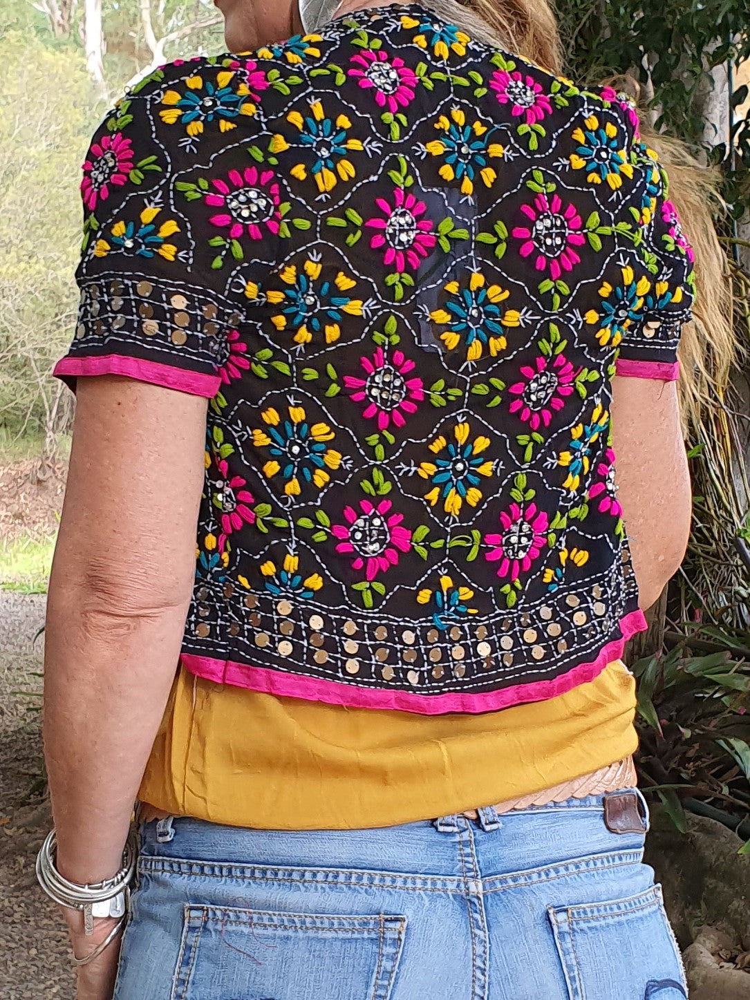 Back view of silk georgette jacket with sequins in black