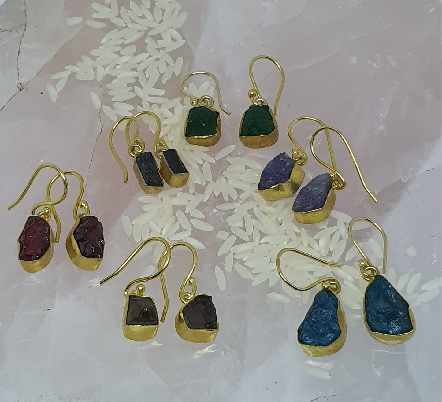 Assorted single drop raw crystal gold earrings