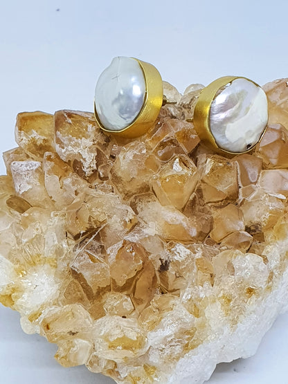 Large pearls set in gold plate