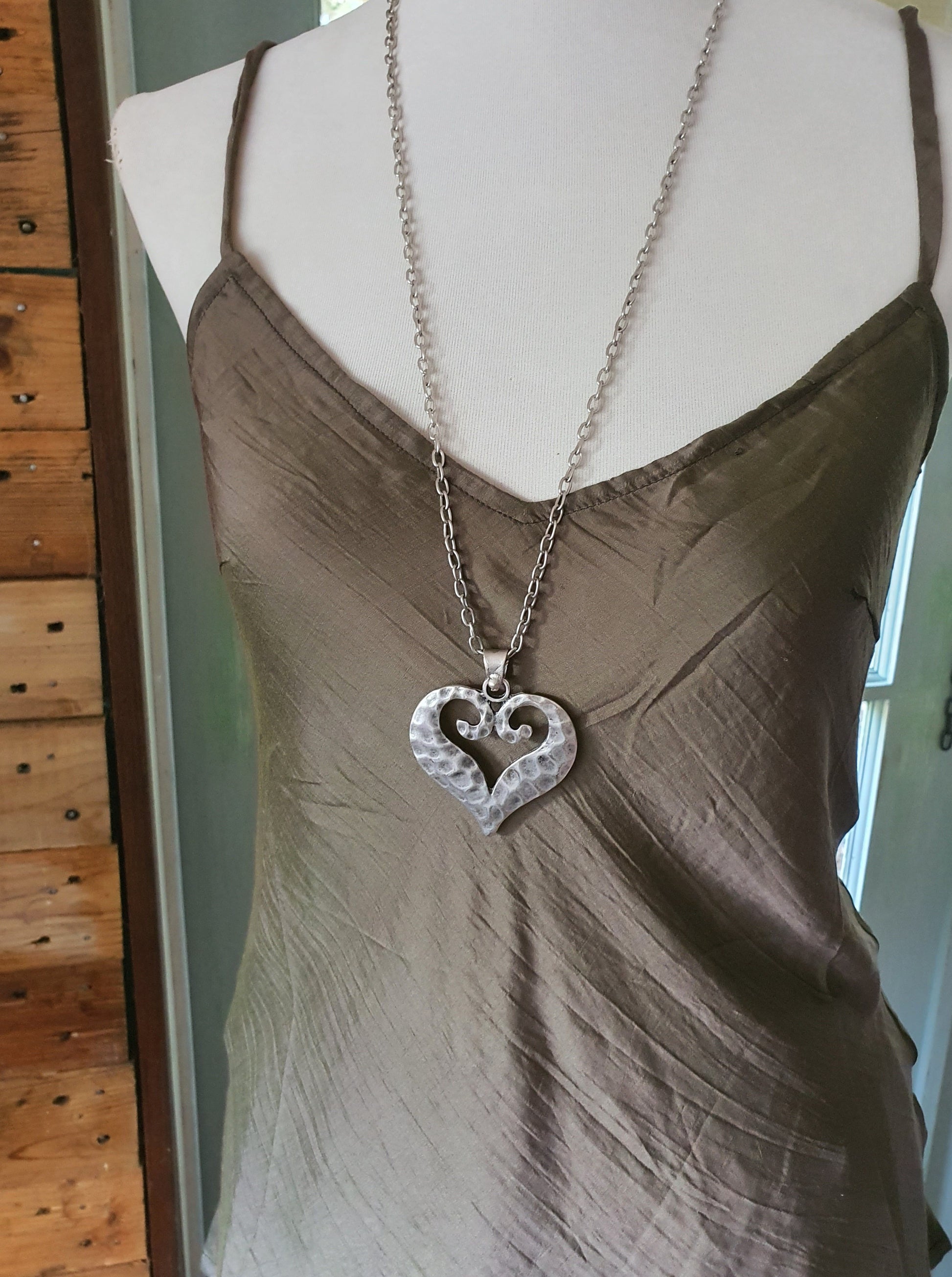 Long chain with heart medallion