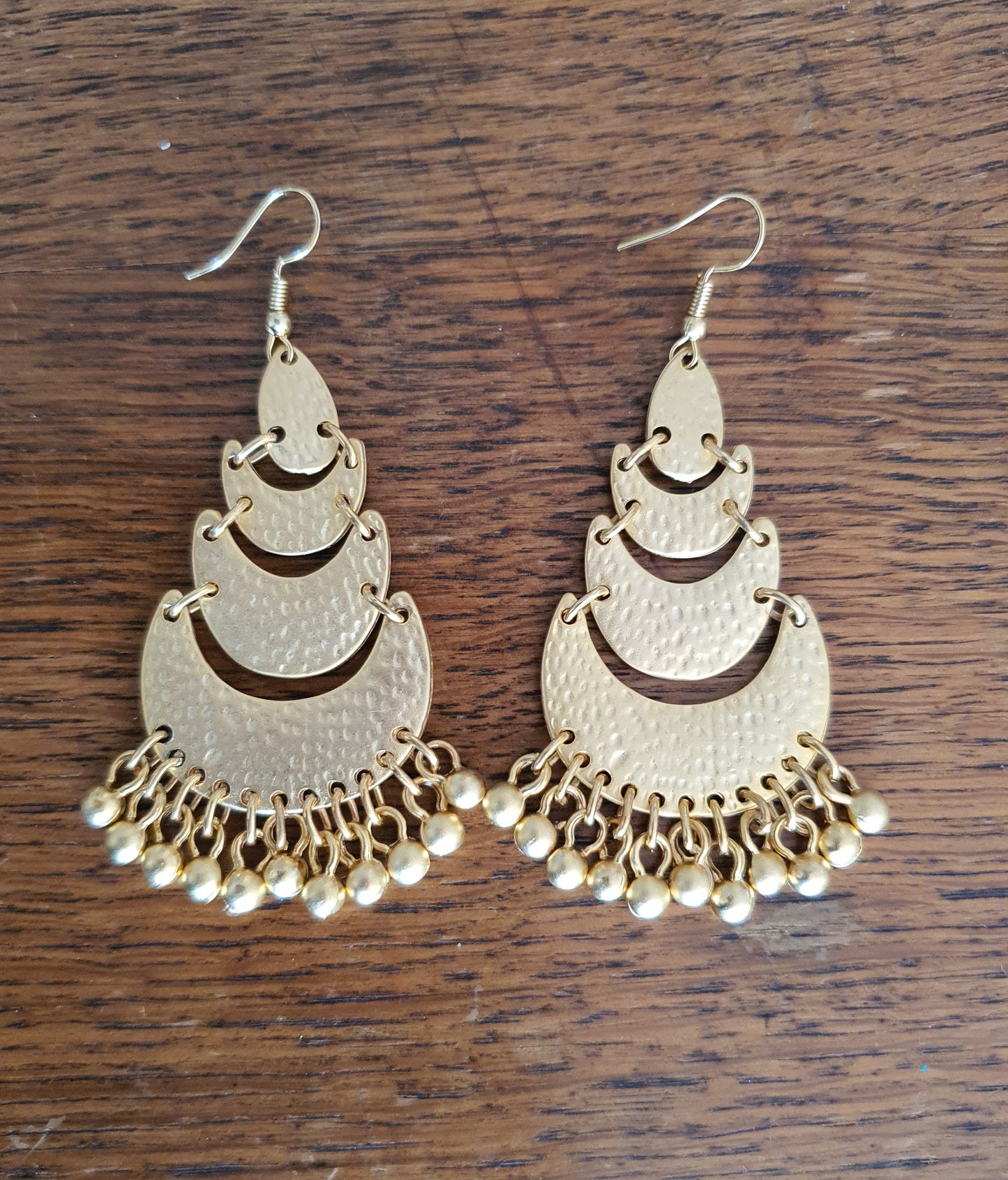 Earrings - Tiers of gold scallops adorned with tiny bells