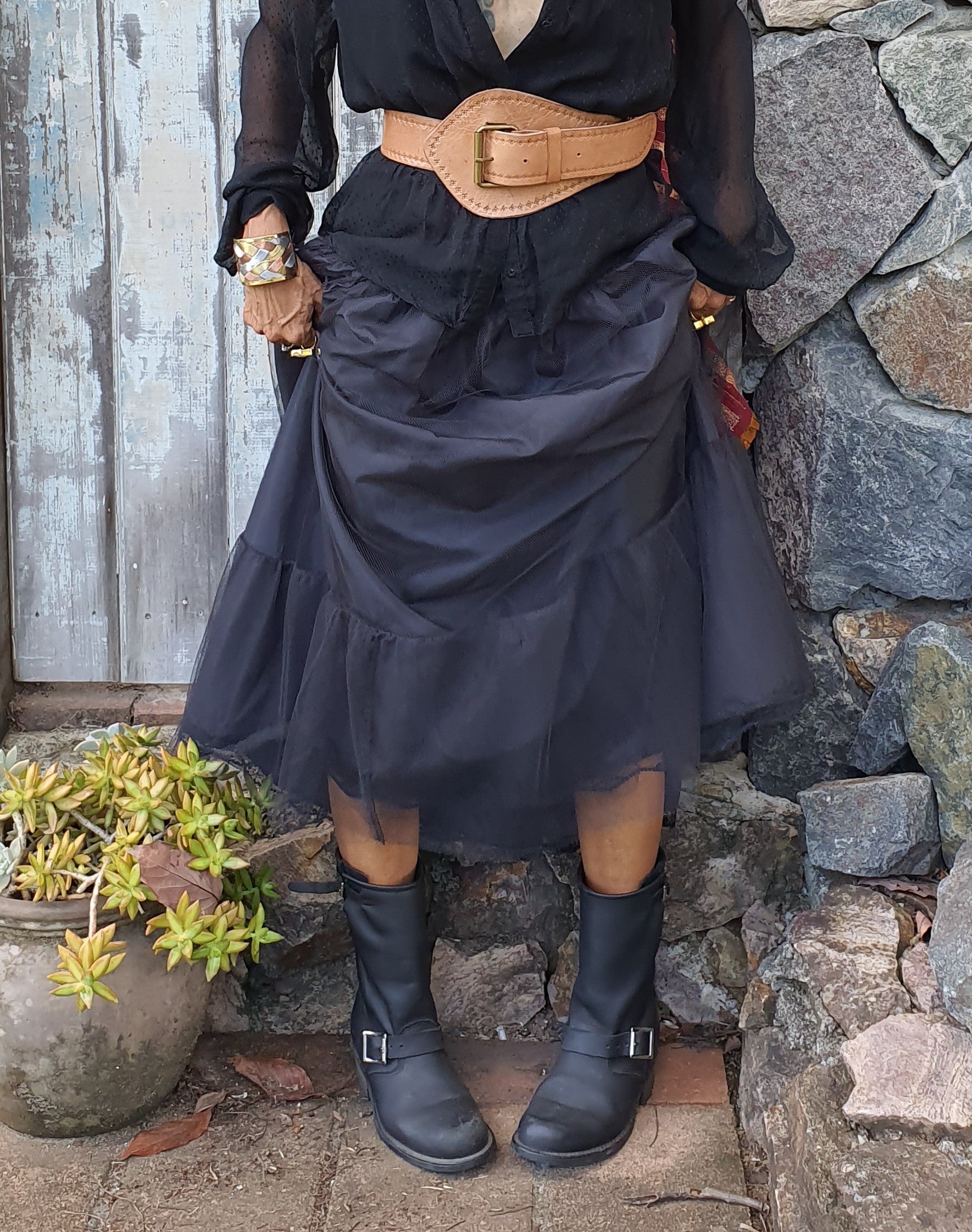 Lady in black boho dress with tan babuskhka leather belt - tfa