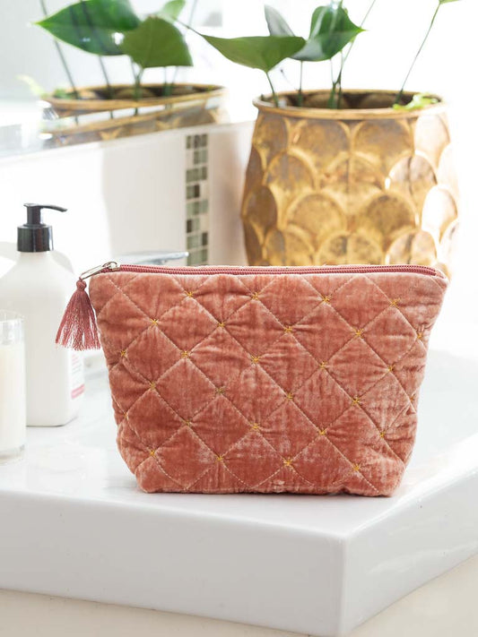  sweet quilted silk velvet clutch in a soft apricot with tassel zip. Waterproof lining - ideal for cosmetic or toiletries bag