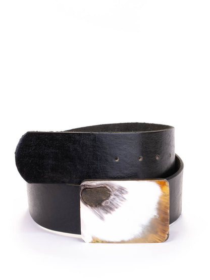 Rectangular bone buckle on a black leather belt.