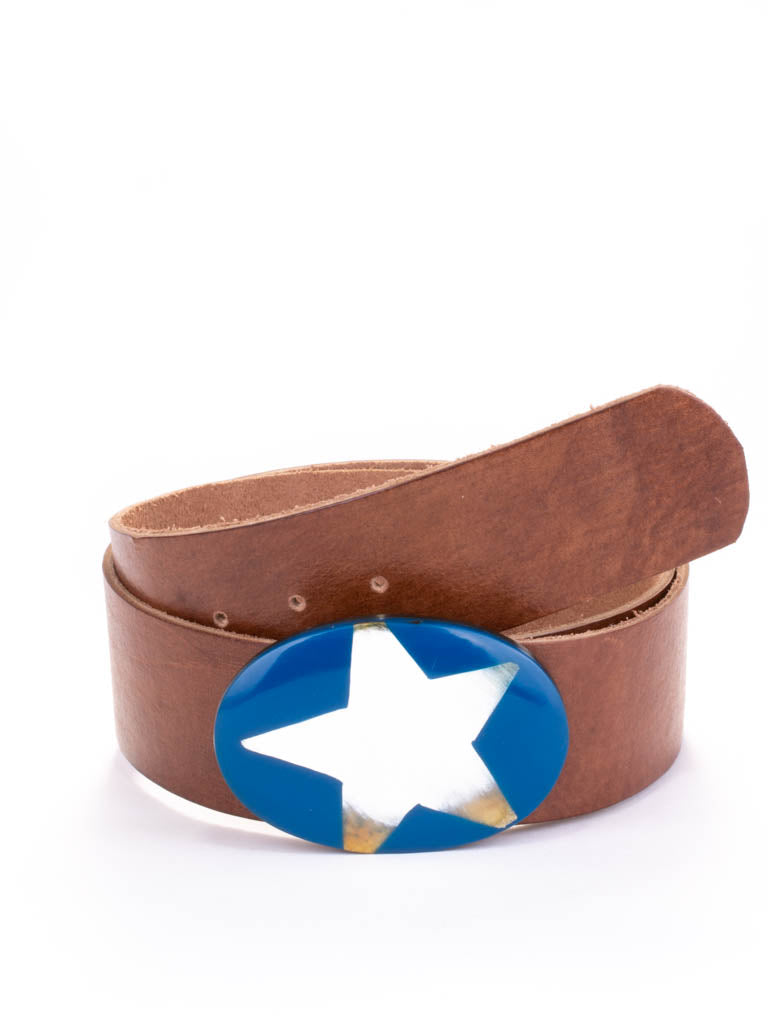Oval shaped Bone and resin buckle on a tan leather belt.
