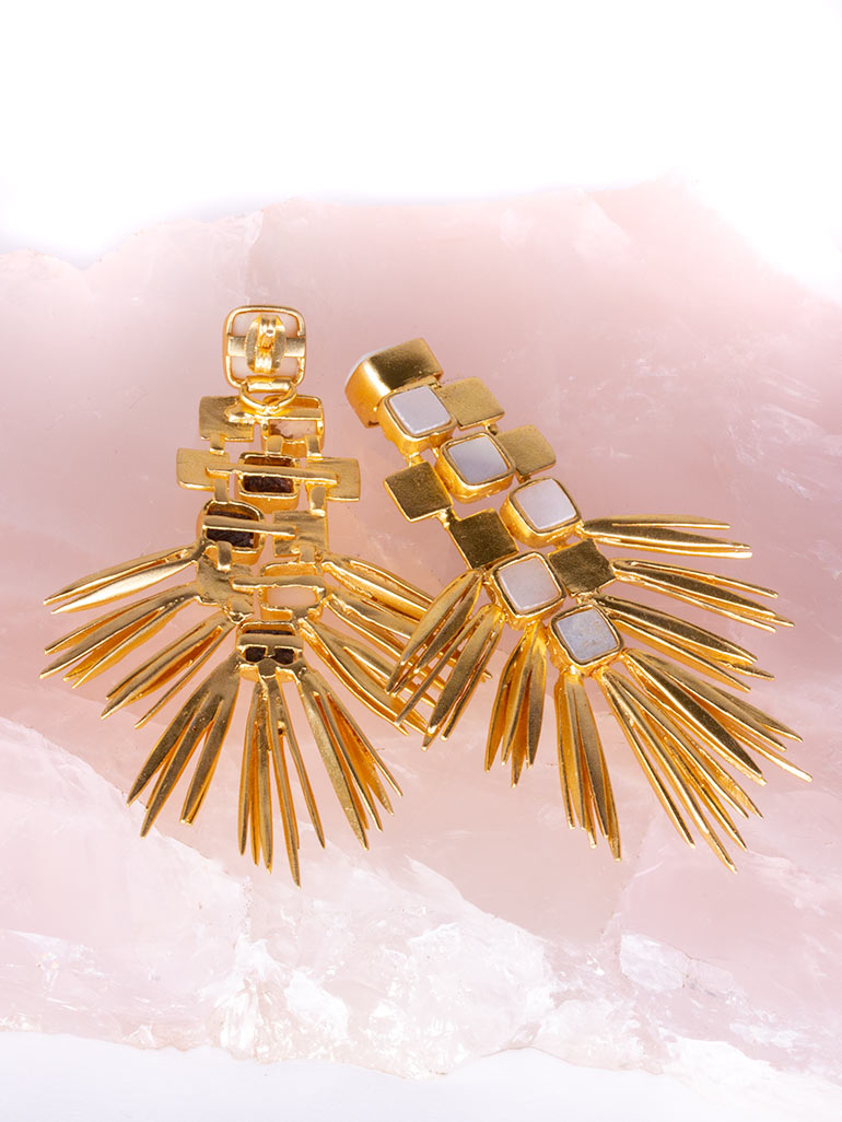 Flat lay gold splayed earrings