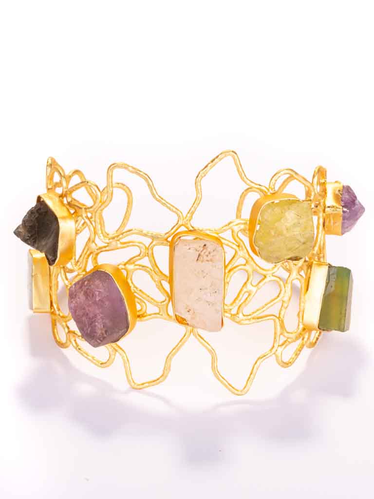 Quality gold-plated brass set with semi precious gems and glass in a squiggly pattern