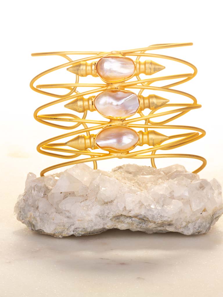 Baroque pearls, set in quality gold plated brass, styled with delicate strands to enfold your wrist.