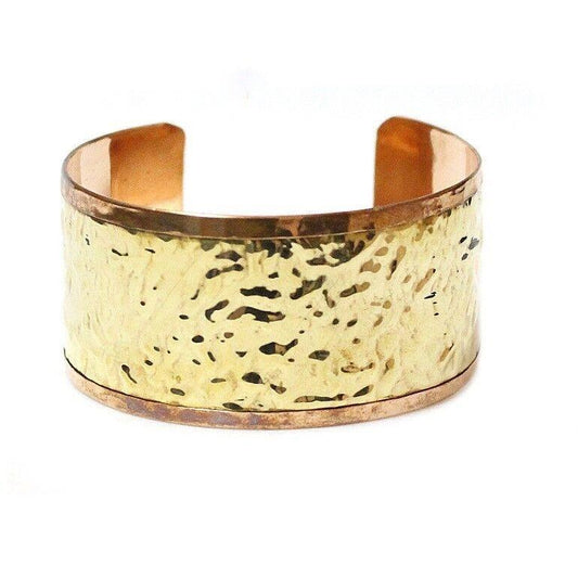  A copper and brass beaten cuff