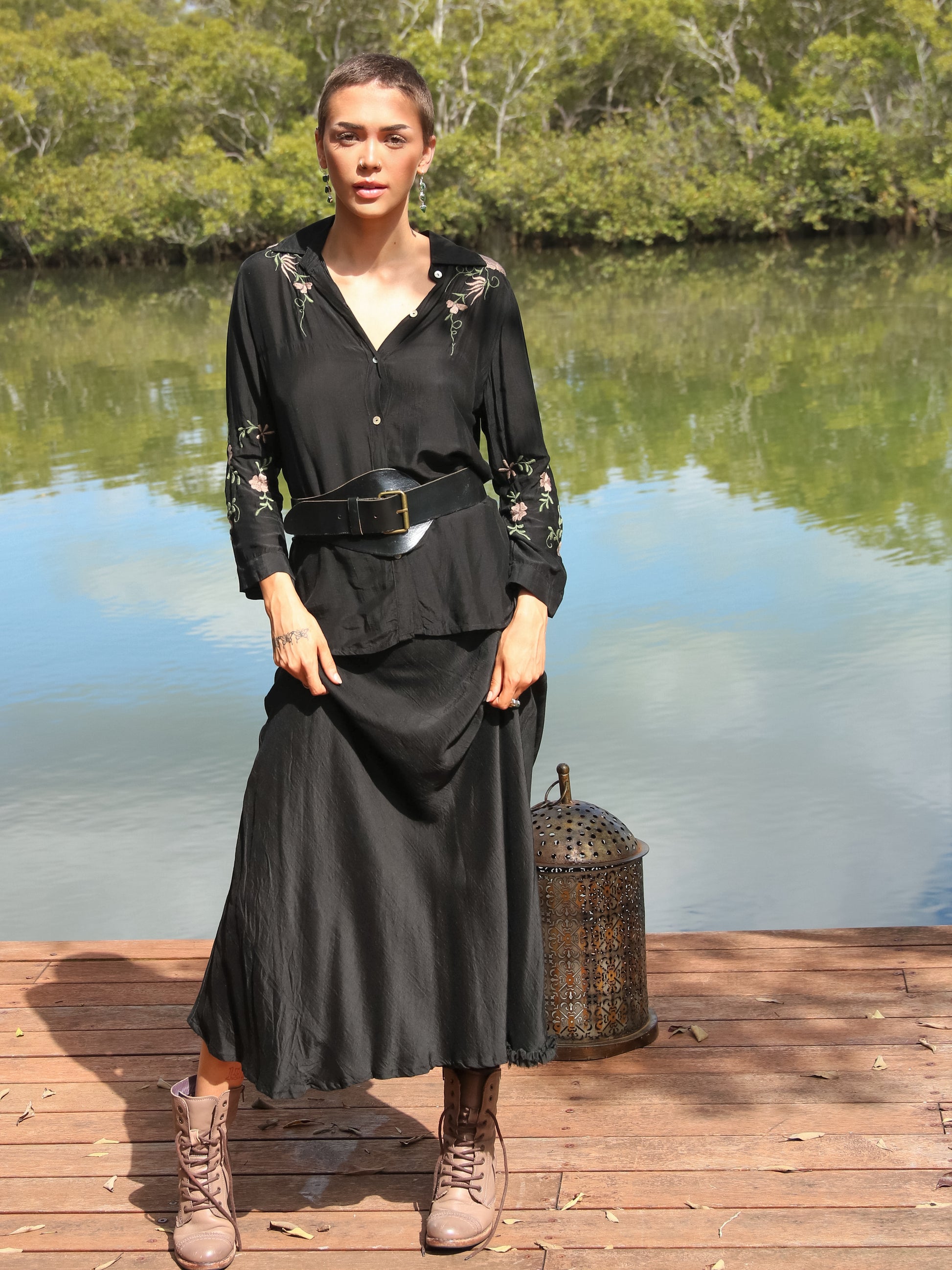 Lady in black silk skirt and shirt