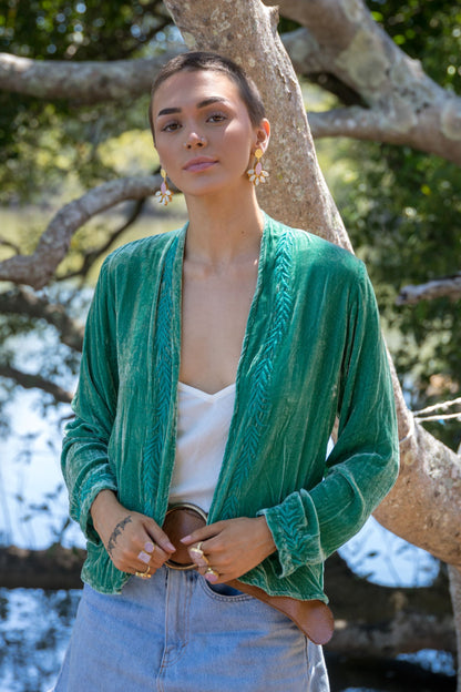 Silk velvet jacket in aqua on model 