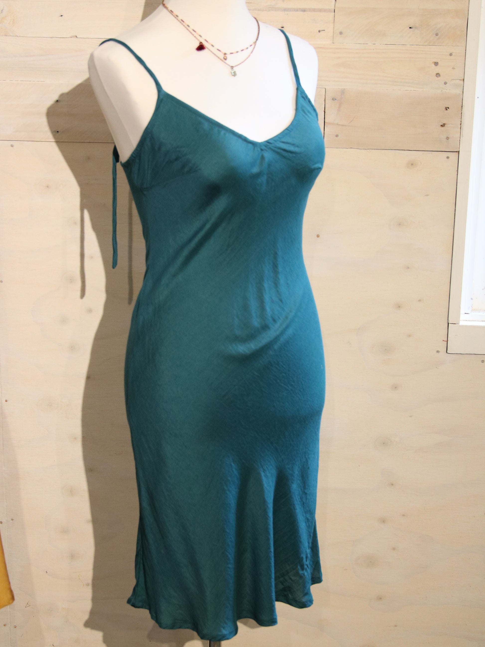 Teal coloured silk slip
