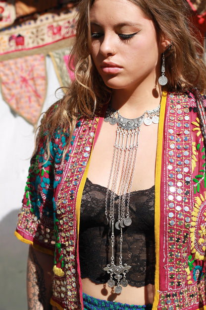 Camilla necklace on a boho model with gypsy jacket and black lace top