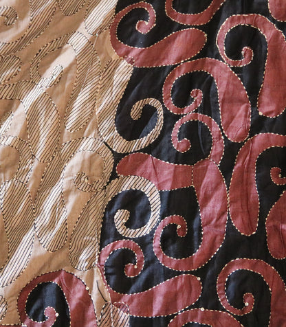 Pattern of skirt showing hand stitching