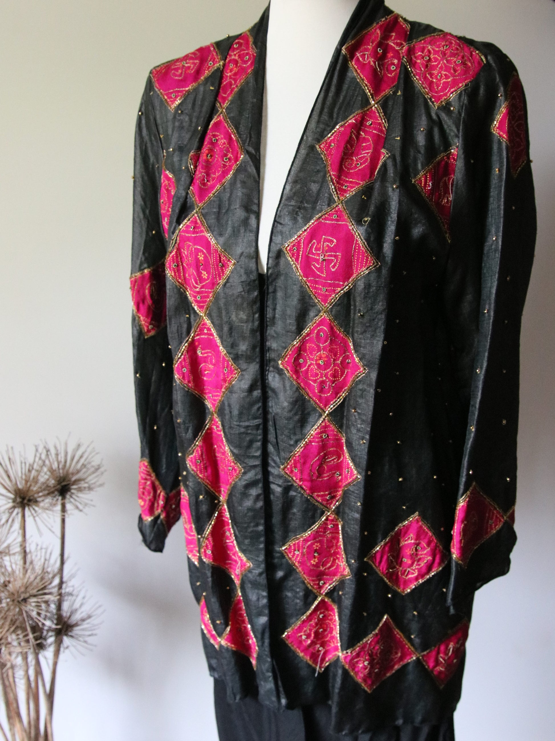 Front view of silk sari jacket black with pink diamonds