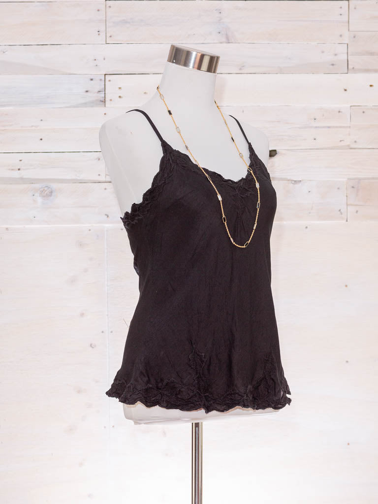 Side view of luxe silk cami in black