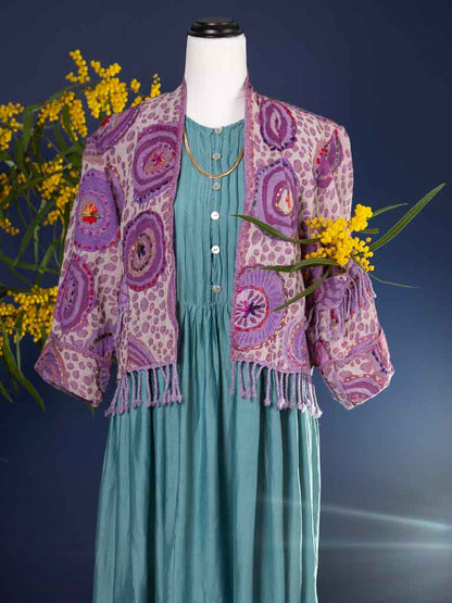 Violet toned wool fringed jacket with circle and dot design