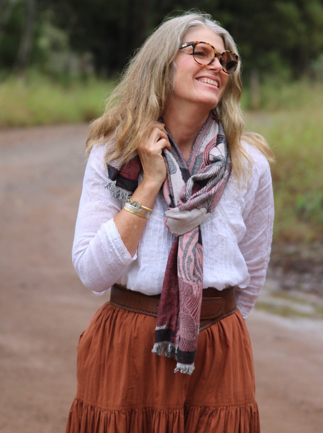 Woman wearing a maroon scarf
