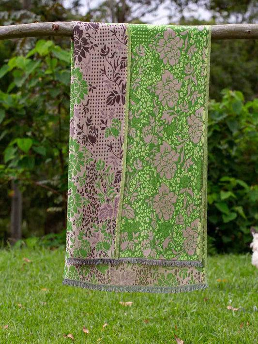 folded and draped scarf of lime green damask patterned scarf