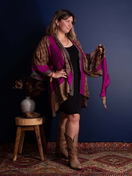 Woman wearing a long kimono style jacket