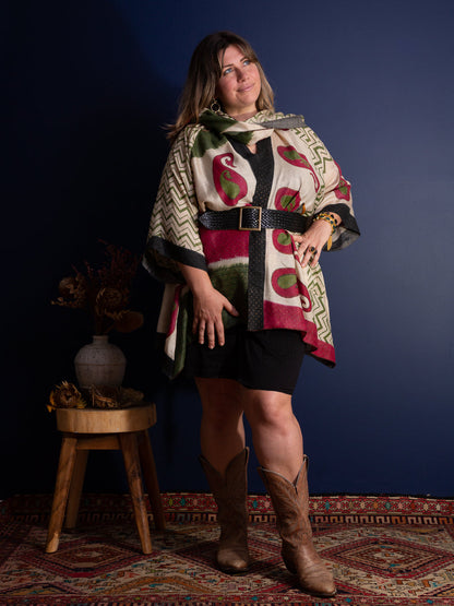 Curvy woman wearing a wide leather belt and boho outfit