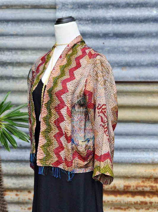 Reversible hand stitched boho silk jacket. Cropped with fringing, 3/4 sleeve & patch pockets