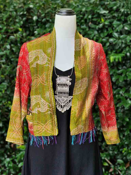 Reversible hand stitched silk jacket. Crop gypsy jacket with fringing,3/4 sleeve & patch pockets.