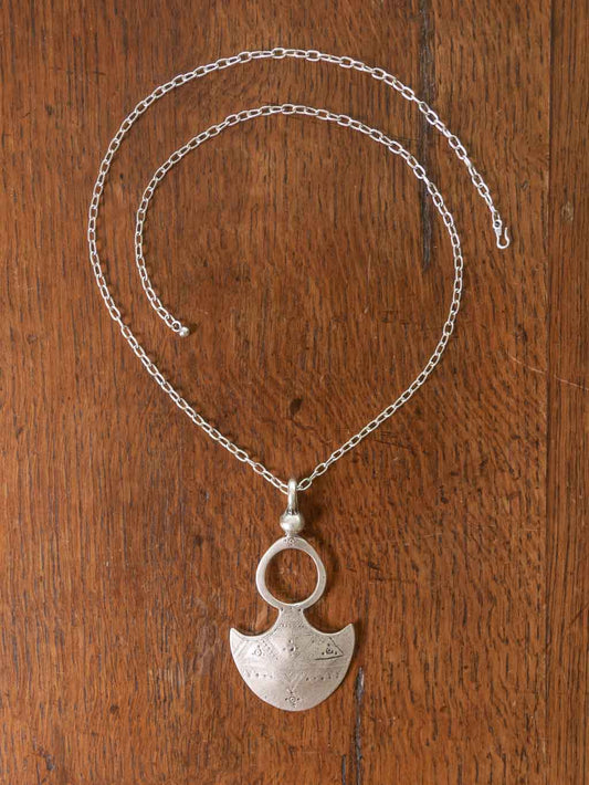 Medallion  Necklace - a tribal symbol on a long chain