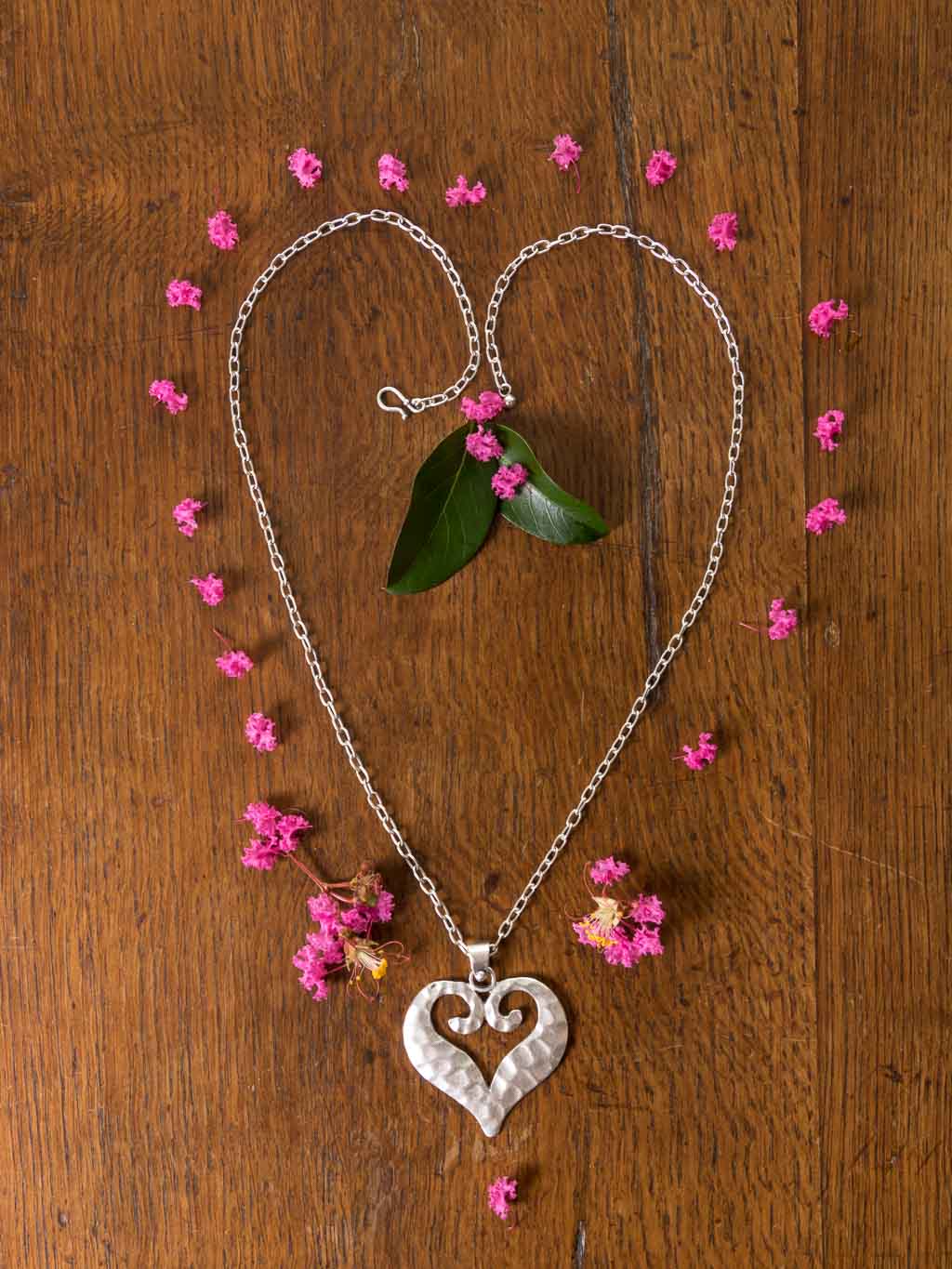 Love Me Necklace - a long chain with abstract heart medallion