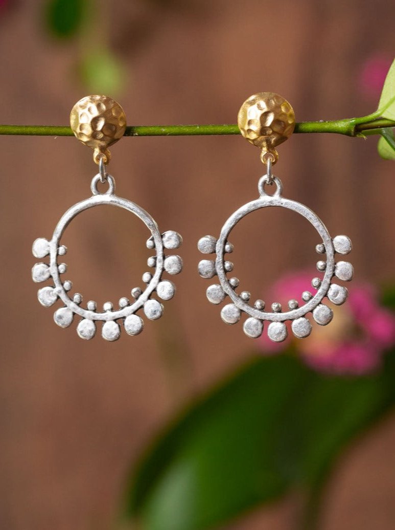 On Pointillism Earrings - Gold stud finding with a silver drop hoop with dot surround.