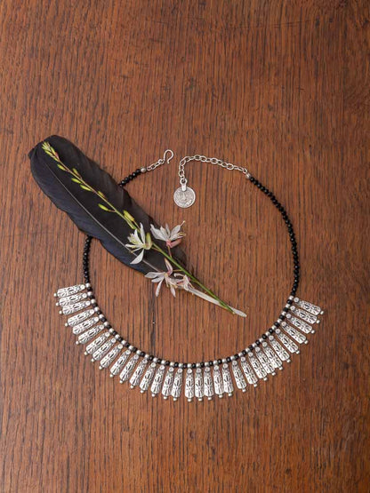 Black beaded with silver pendants necklace