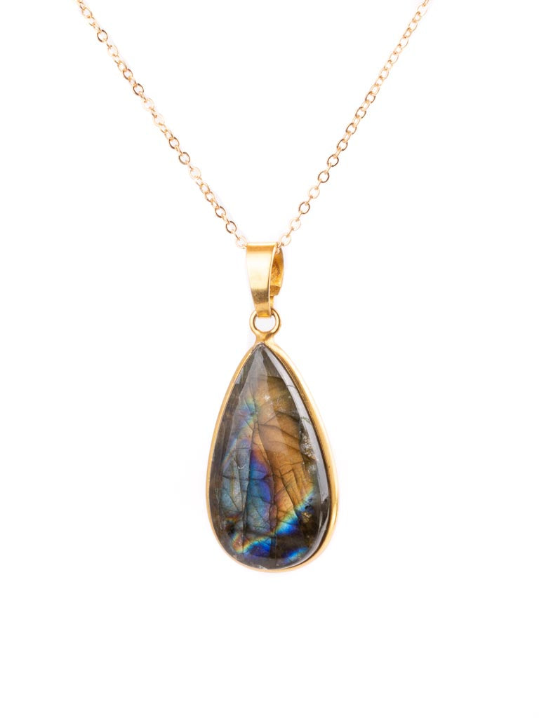 A labradorite pendant set in gold teardrop shaped