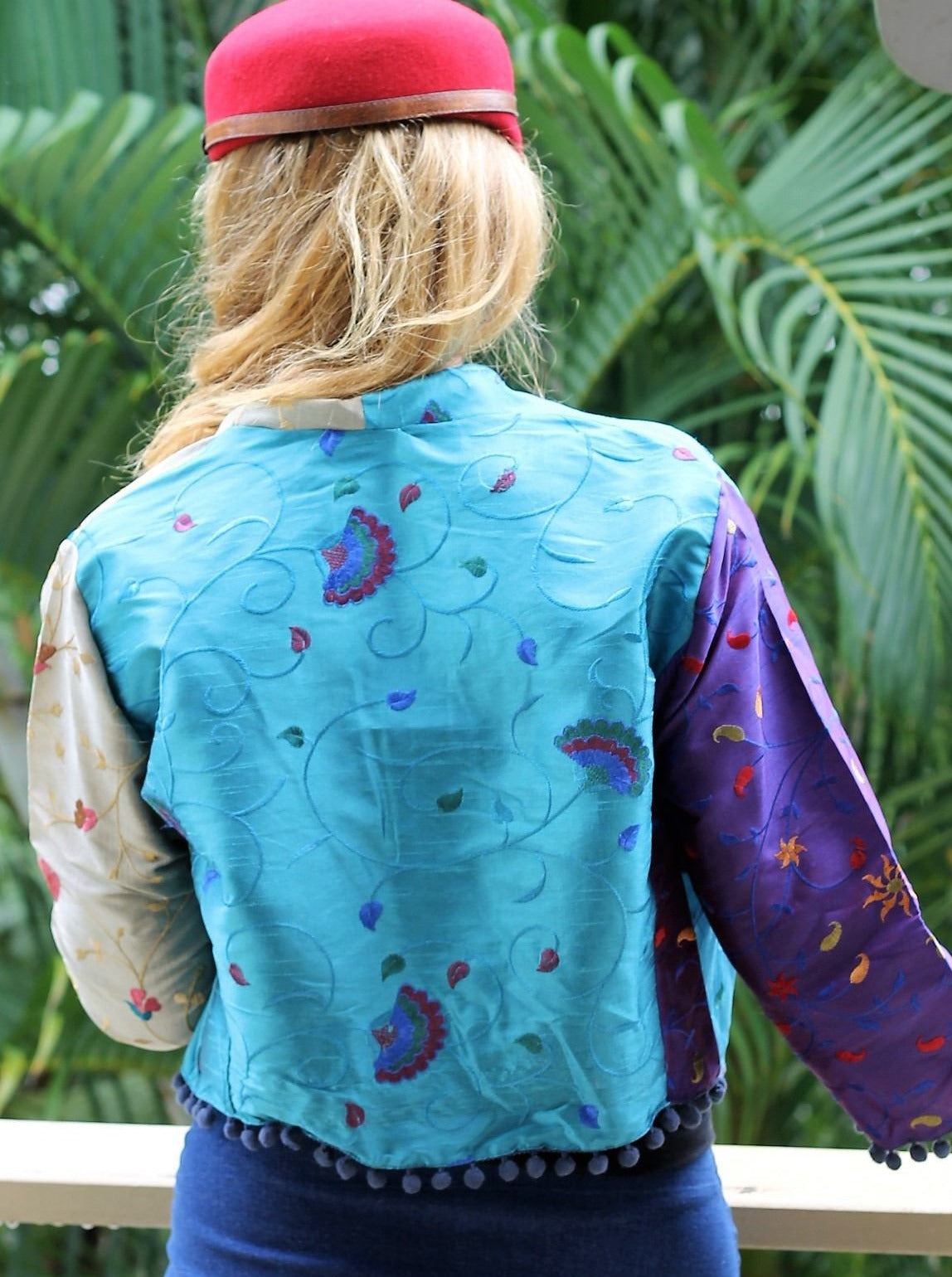 Back panel of turquoise rodeo jacket