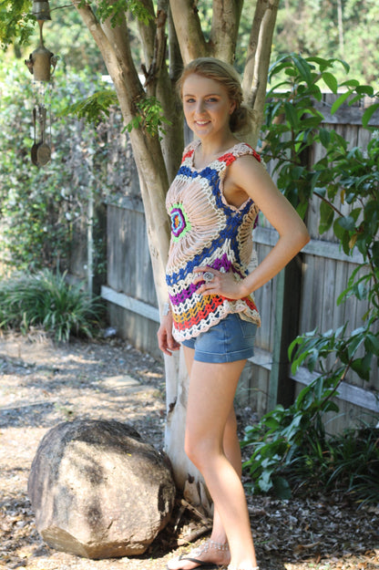 CROCHET TOP.  Grandmas's been busy with this vibrant multi-coloured top.  Size 8-12 would fit.