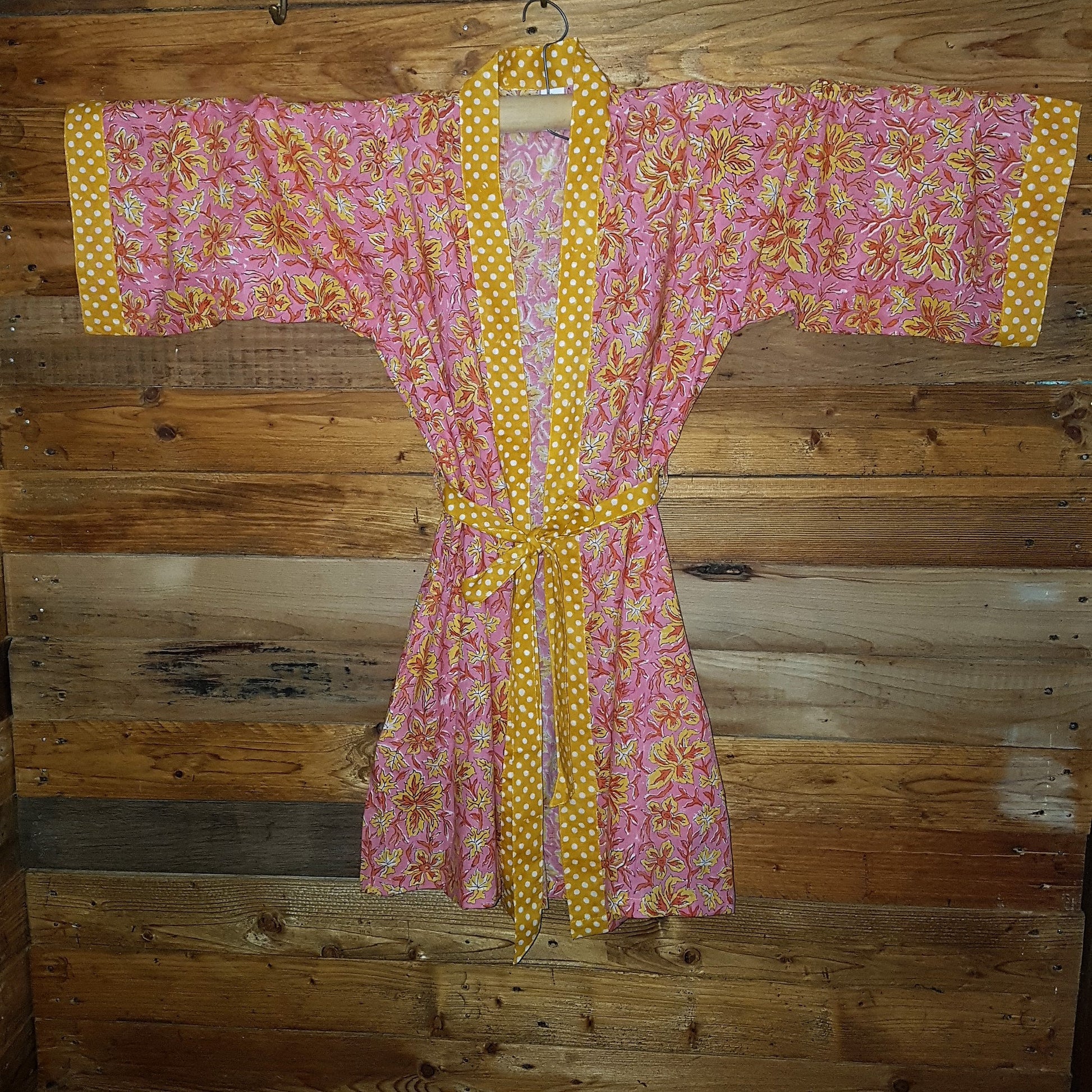 Hand block print robe on a hanger