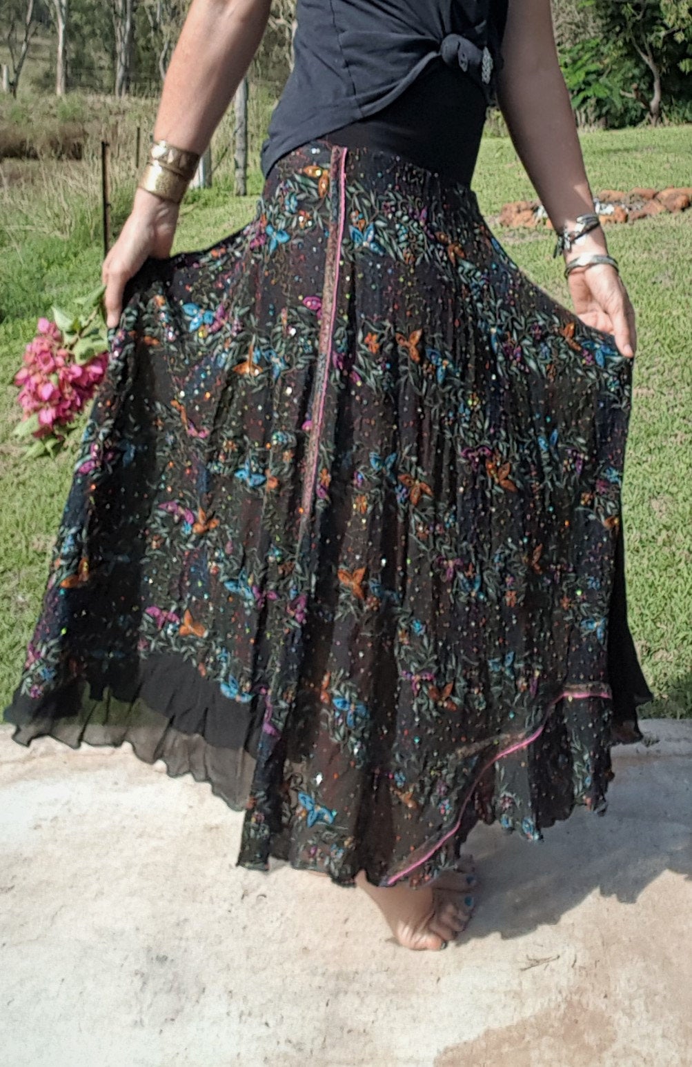 Lady wearing upcycled silk skirt maxi in black